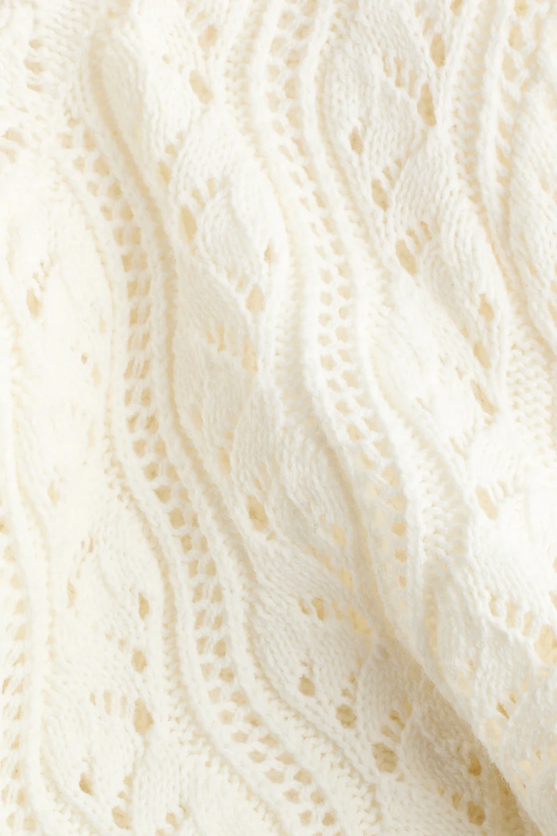 Gilet en tricot pointelle avec liens à nouer