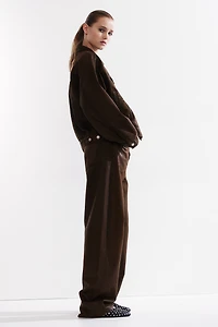 Pantalon en sergé enduit