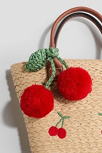 Sac en paille avec appliqué