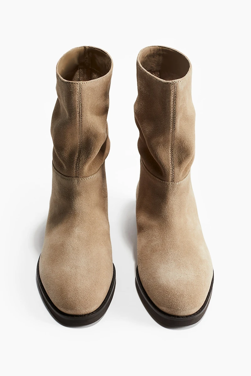 Bottines en cuir à mi-mollet