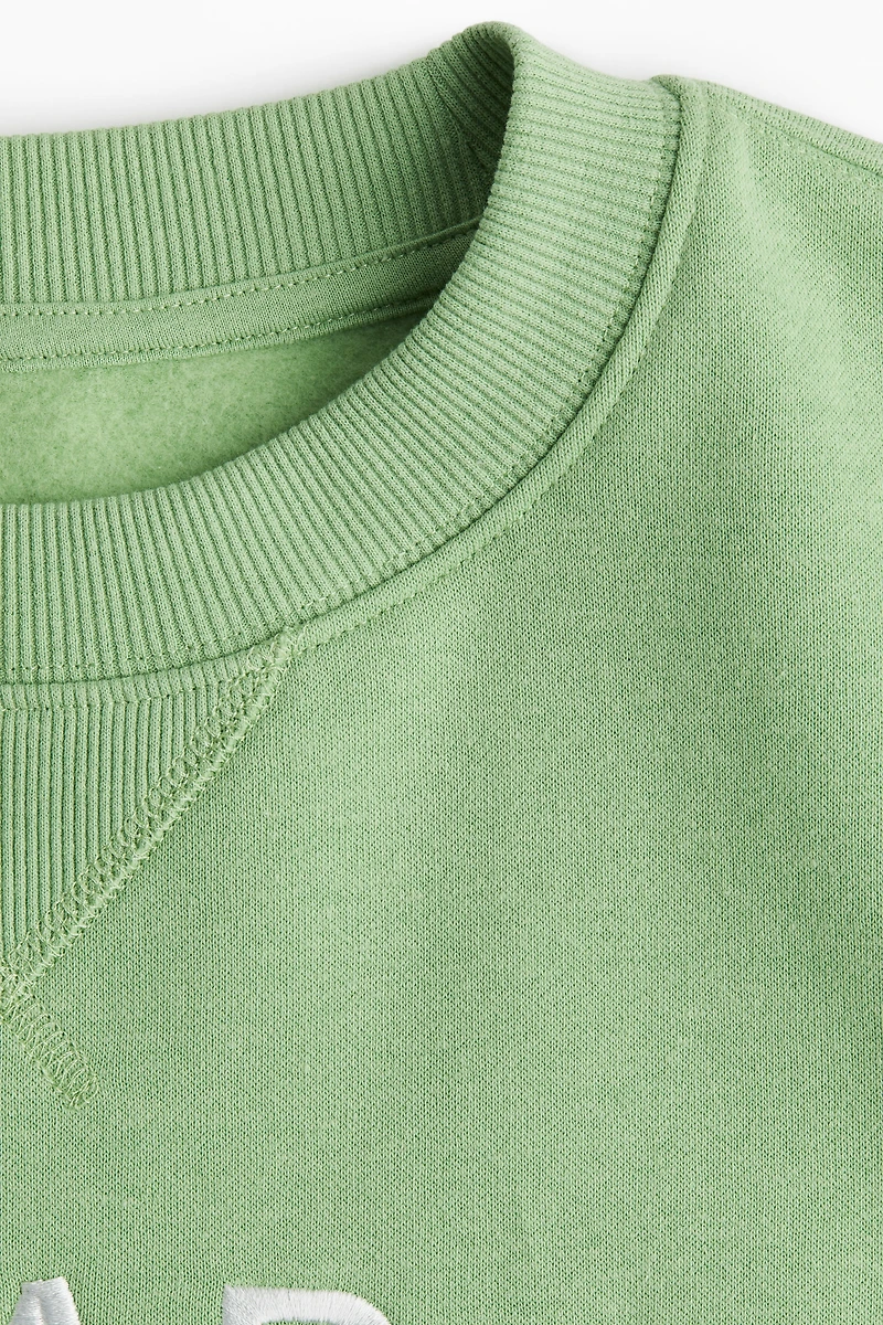 Sweatshirt with Text Motif