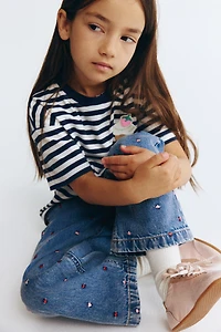 Jean jambes larges sur taille élastique
