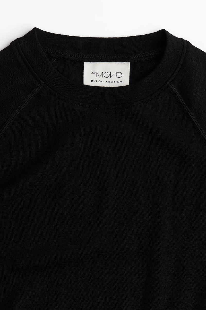 Haut moulant de base ski en laine