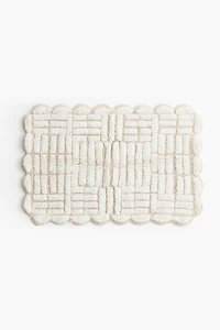 Tapis de bain en coton bouclé