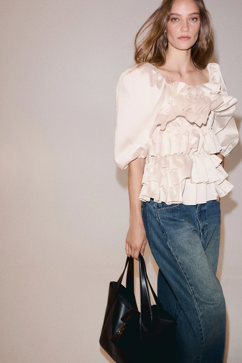 Blouse à volants plissés manches bouffantes
