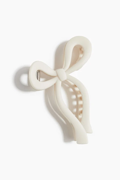 Pince à cheveux en forme de boucle