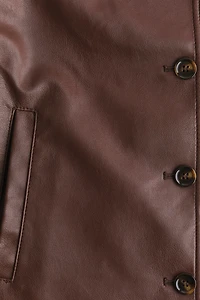 Veste en tissu enduit