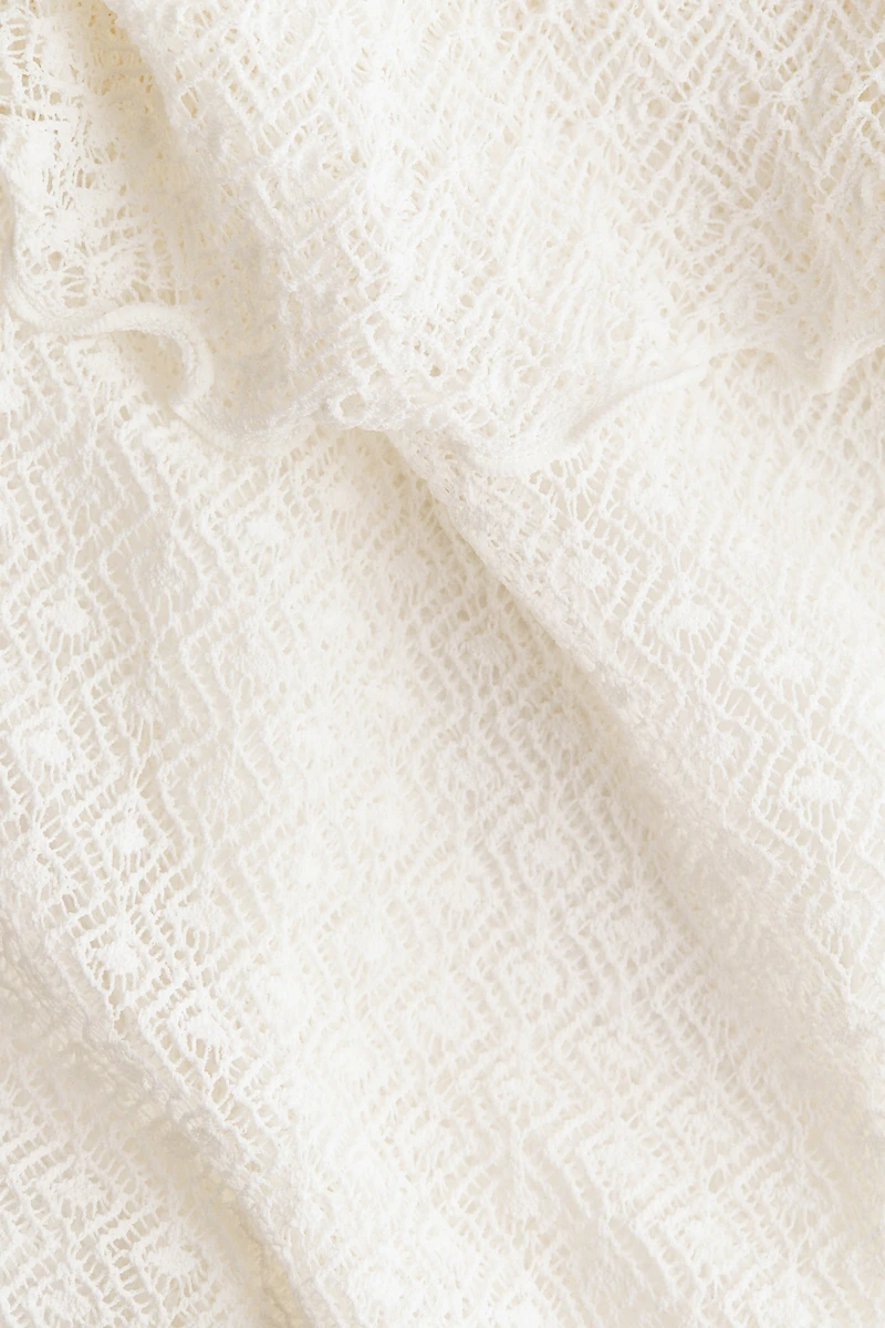 Haut à bretelles fines en tricot pointelle