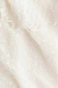 Haut à bretelles fines en tricot pointelle