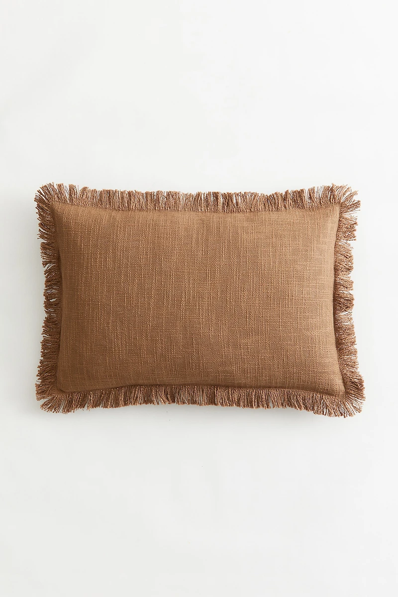 Housse de coussin en tissu flammé