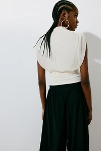 Haut sans manches à effet drapé