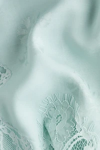 Haut en tissu jacquard avec dentelle