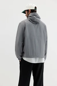 Veste coupe-vent à capuche