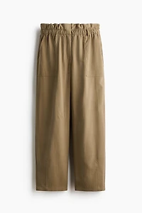Pantalon taille froncée avec jambes tonneau