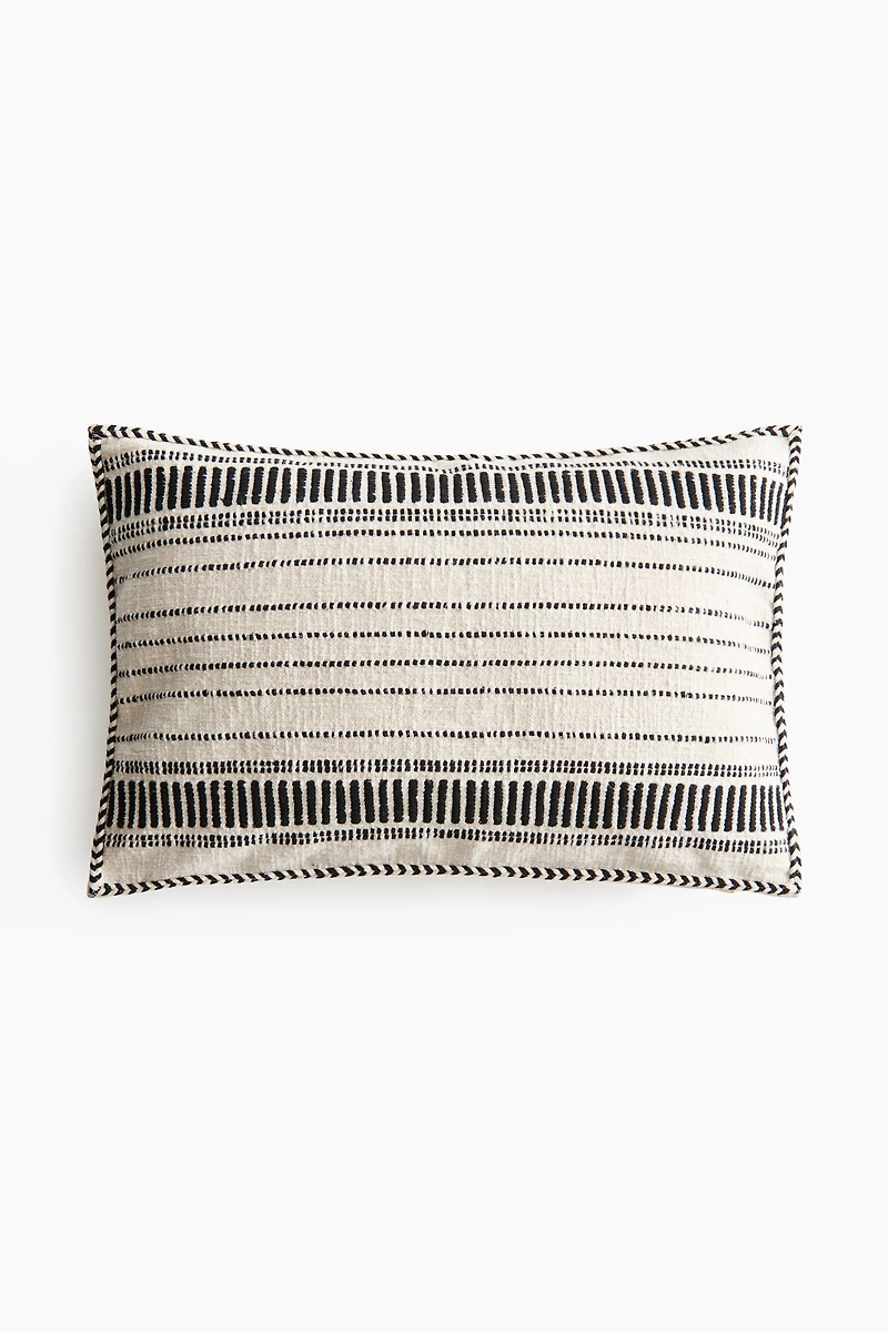 Housse de coussin en coton à motif