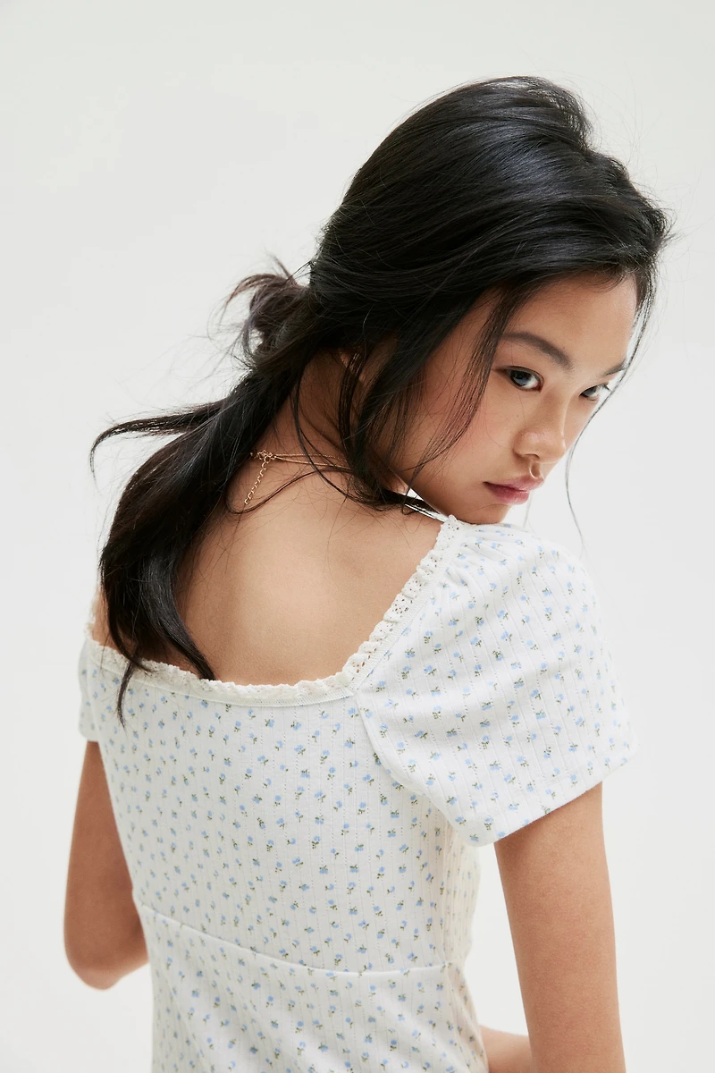 Lace-Trimmed Dress with Flared Skirt