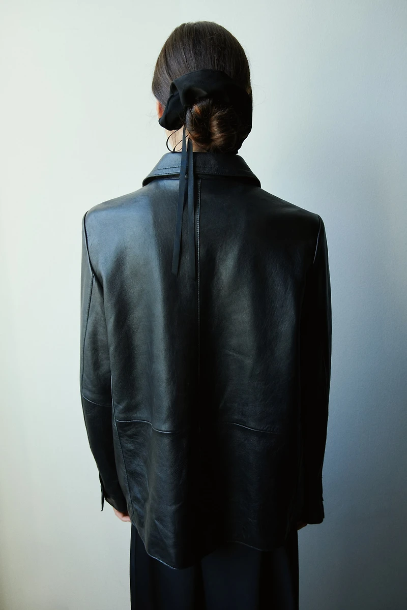 Cache-élastique avec une boucle