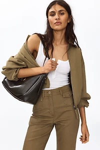 Flared ankle-length trousers