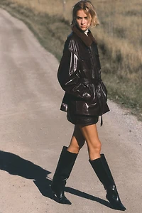 Veste en tissu enduit avec ceinture