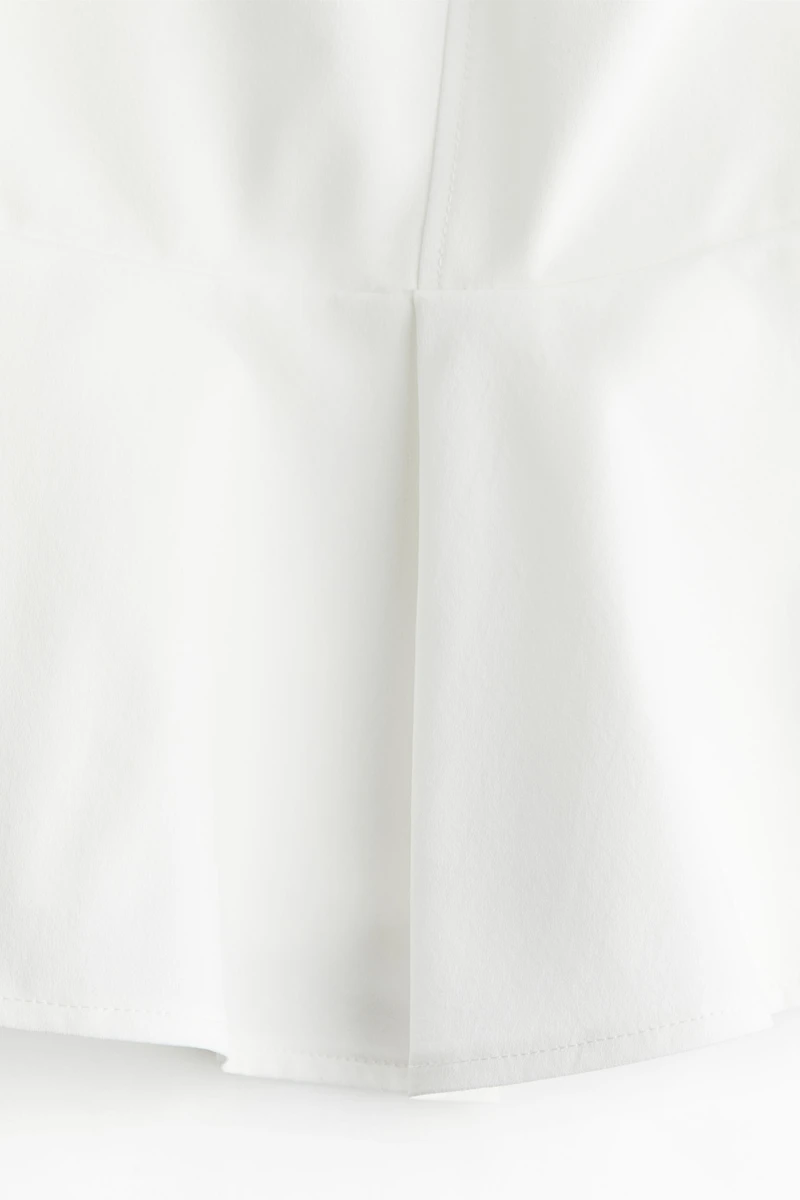 Haut bandeau péplum