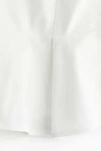 Haut bandeau péplum