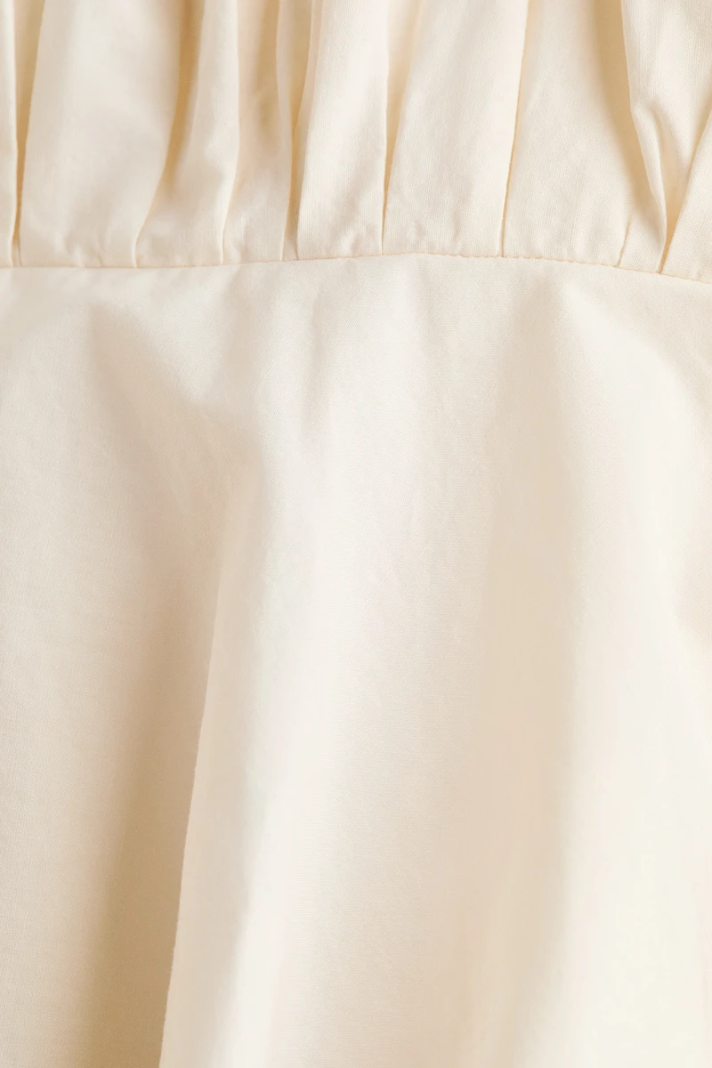 Asymmetric Bubble-Hem Strappy Top