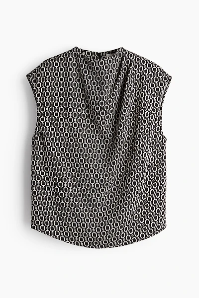 Blouse à effet drapé