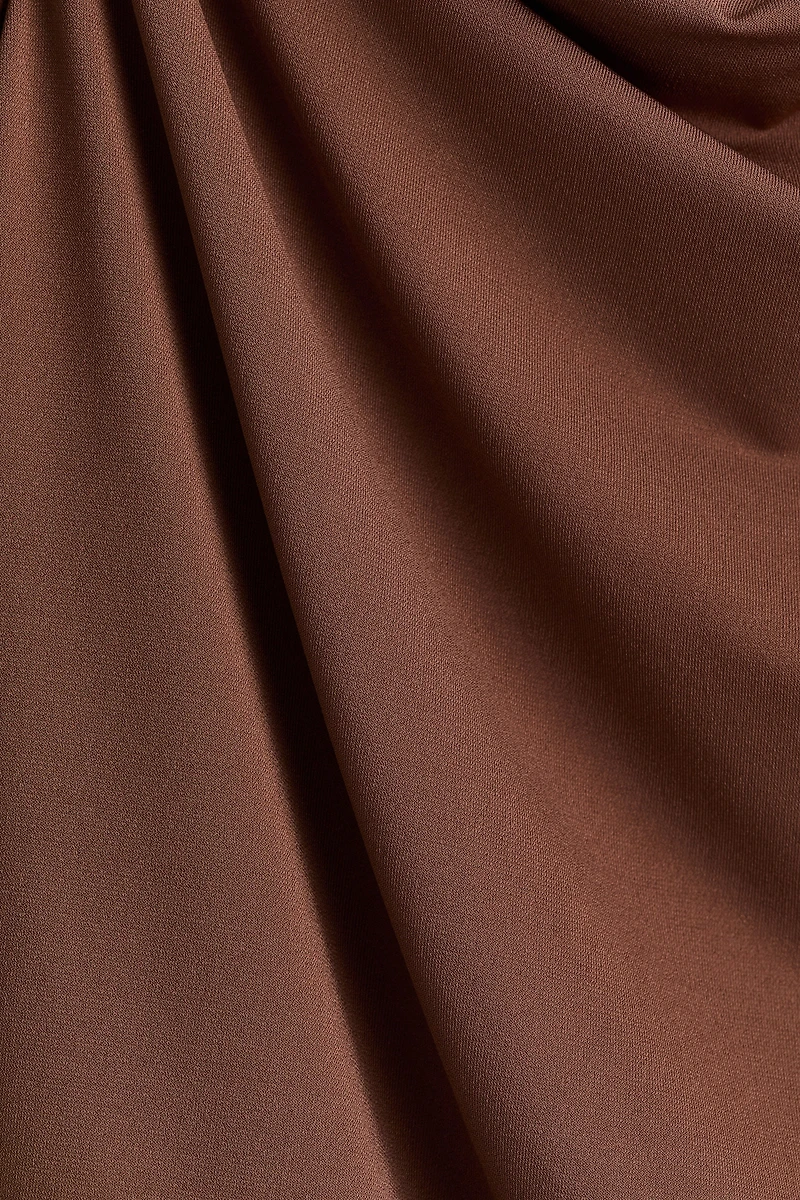 Draped Asymmetric Top