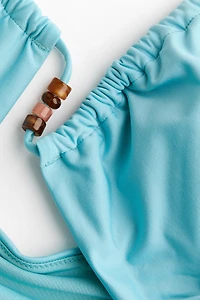 Maillot de bain coussiné avec ouverture