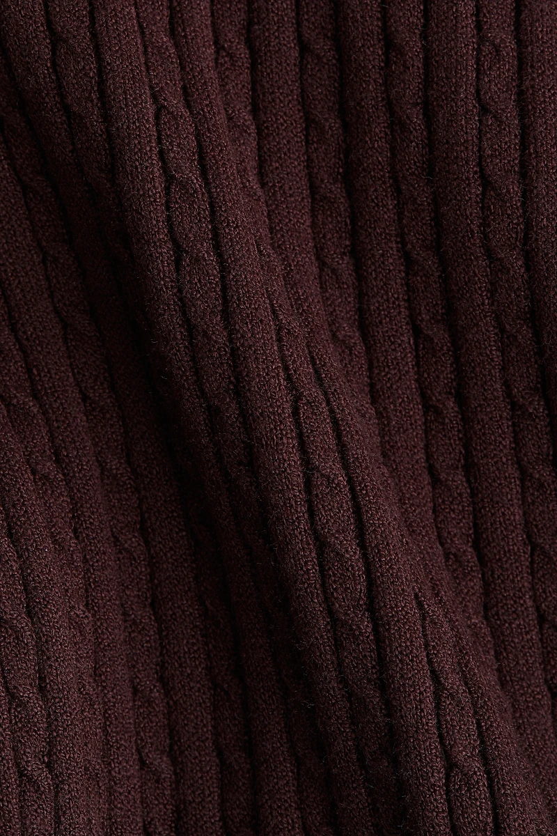 Haut en tricot torsadé