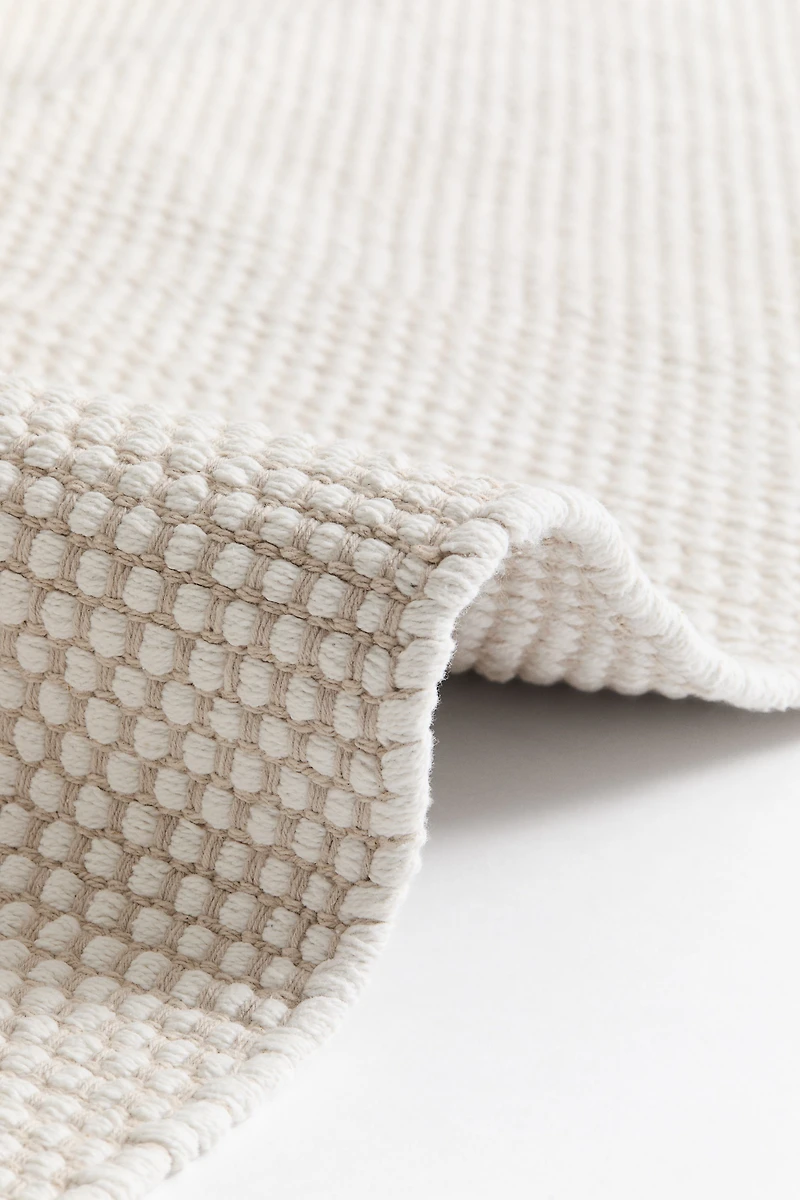 Tapis en coton texturé