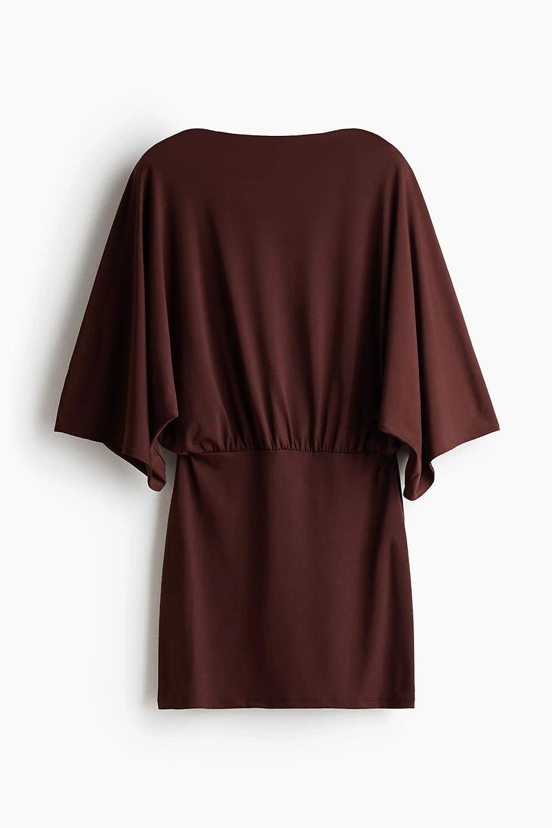 Cape-Sleeved Low-Back Dress
