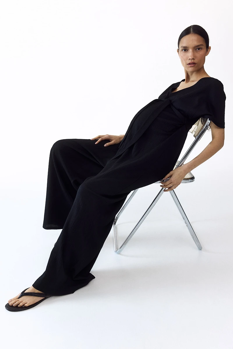 MAMA Short-sleeved tie-belt jumpsuit