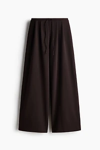 Pantalon plissé avec cordon de serrage