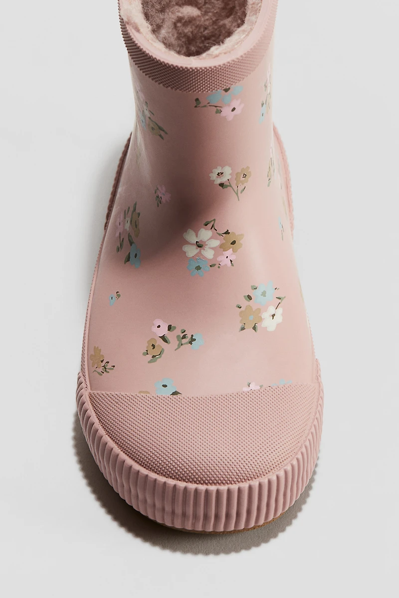 Bottes en caoutchouc doublées de polar