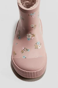 Bottes en caoutchouc doublées de polar