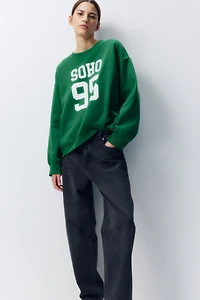 Sweatshirt with Text Motif