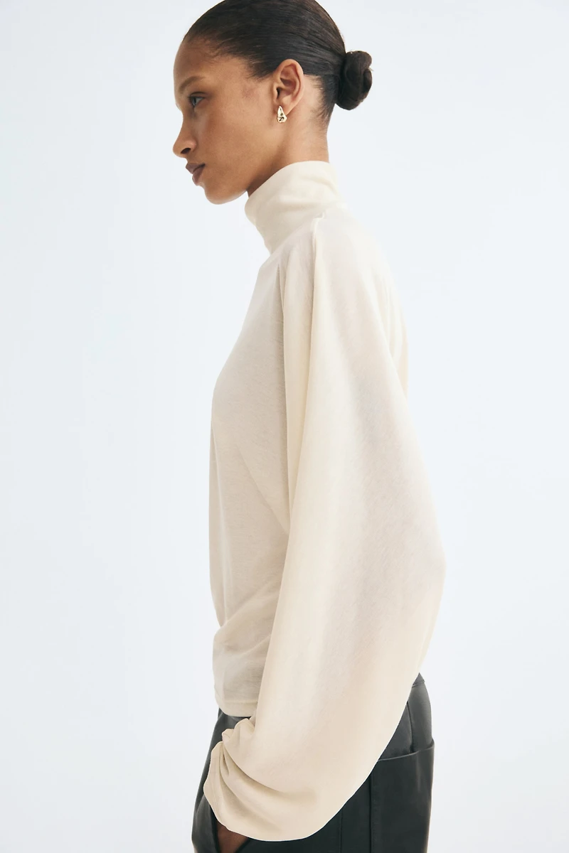 Batwing-Sleeved Mock Turtleneck Top
