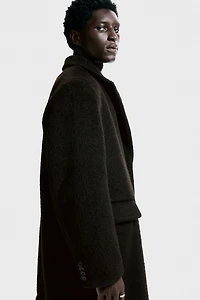 Manteau à fermeture droite en laine mélangée