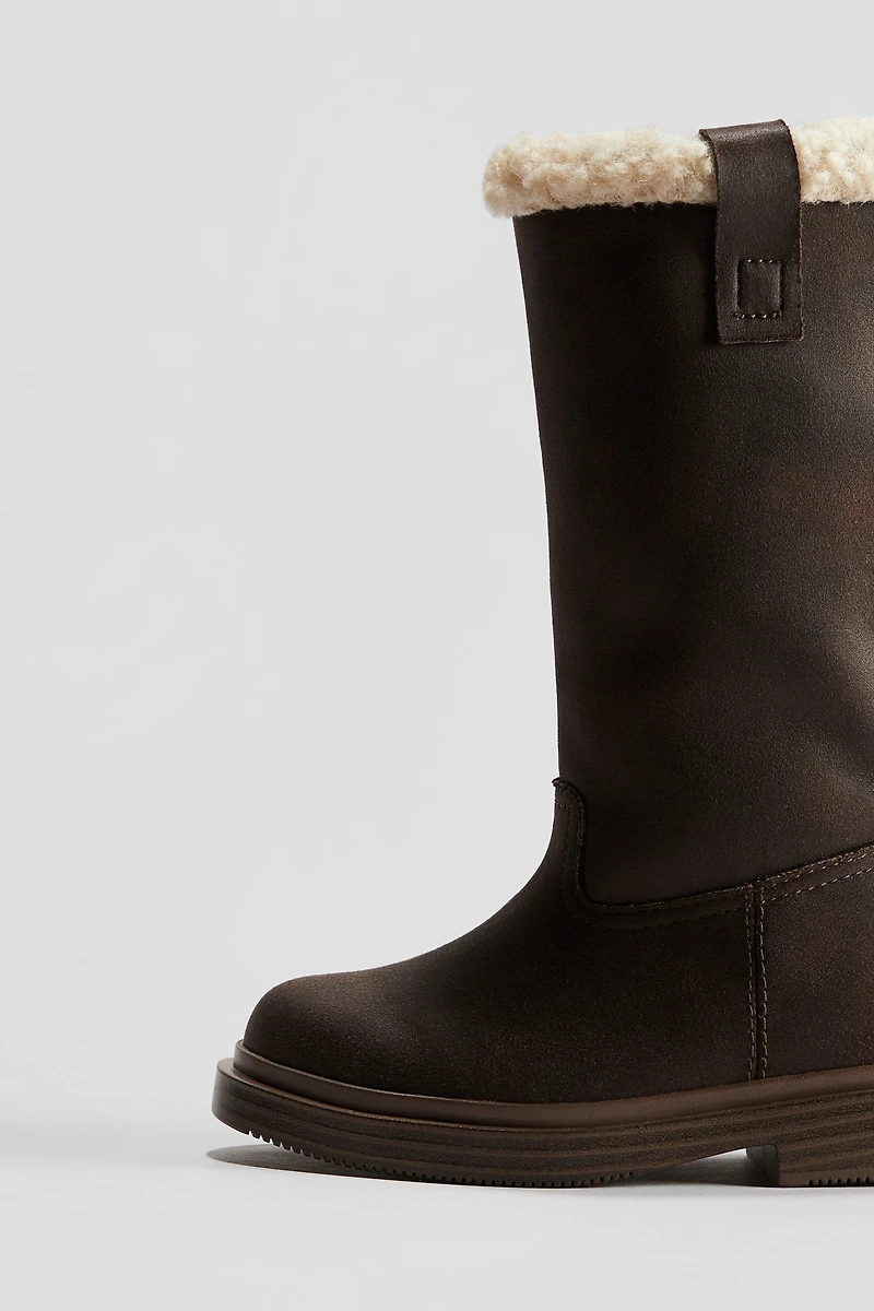 Bottes à mi-mollet chaudement doublées