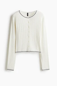 Gilet en tricot torsadé