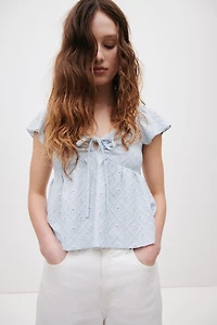 Blouse en jersey pointelle