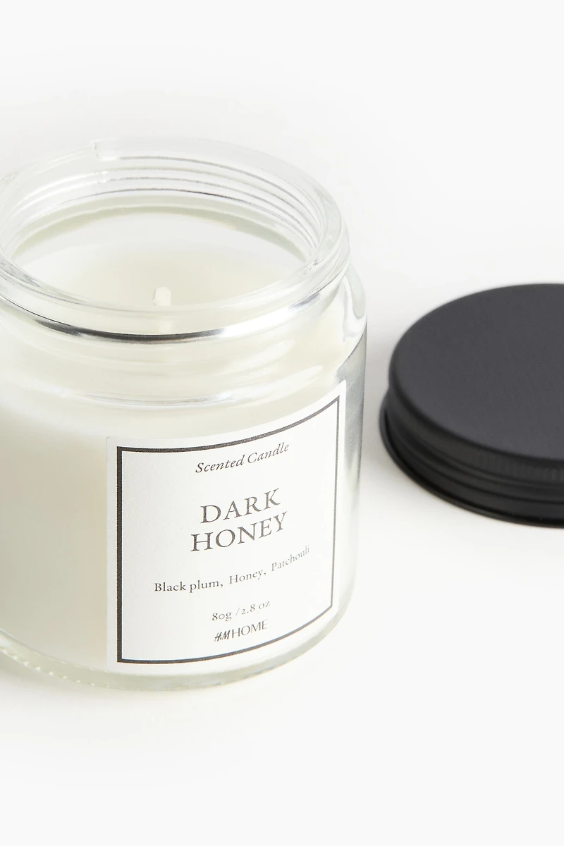 Bougie parfumée dans un pot en verre