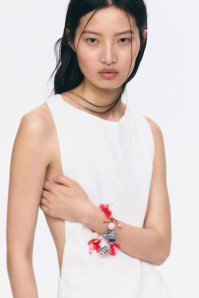 Bracelet cordon orné