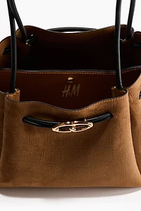 Sac à bandoulière avec cordon de serrage