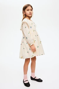 Robe brodée et volantée en coton