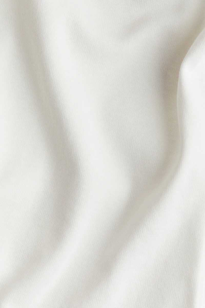 Haut à encolure dégagée