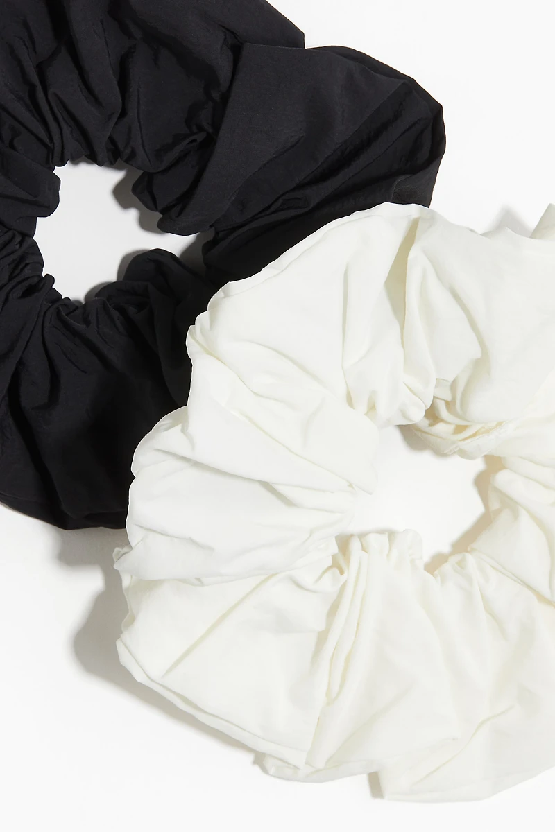 Lot de 2 cache élastiques en nylon