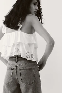 Jean ample à la cheville taille haute