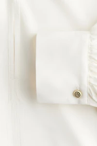 Blouse volantée avec cordon de serrage